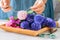 Woman tieing bouquet of hyacinth flowers. Life style photo. Copy