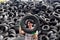 Woman in a tire recycling plant