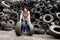 Woman in a tire recycling plant