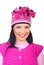 Woman with toothy smile in pink knitted cap