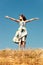 Woman on top of the hill, blue sky , summer day