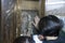 woman touches an icon of the blessed virgin Mary in Church