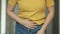 Woman touching his stomach. Stomach pain and others stomach disease concept.Girl having a stomachache. Young woman