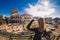 Woman tourist enjoying the view of the Roman Colosseum in Rome,