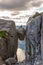 Woman tourist on Kjeragbolten Travel Norway Kjerag mountains