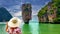 Woman tourist looking at James Bond island in Thailand