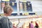 Woman tourist looking at timetable in airport