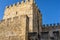 Woman tourist in the medieval castle `Fernandina Wall` of Lisbon, Portugal.