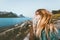 Woman tourist at Norway seaside enjoying view outdoor