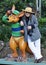 Woman tourist posing with kangaroo statue Gold Coast, Australia