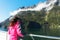 Woman Tourist on Ship Deck in Milford Sound