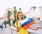 Woman tourist with slovenian flag in Ljubljana, Slovenia, Europe