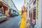 Woman tourist on the Street in the Portugese style Romani in Phuket Town. Also called Chinatown or the old town