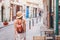 Woman tourist on the street, summer travel concept