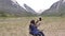 Woman tourist with tablet talking on video call. against the backdrop of the mountains