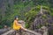 Woman tourist on top pagoda of Hang Mua temple, rice fields, Ninh Binh, Vietnam. Vietnam reopens borders after