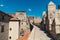 Woman tourist walks on the fortress of the city of Avila in Spain