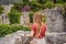 Woman tourist walks through the old town of Bar in Montenegro. Happy tourist walks in the mountains. Suburbs of the city