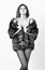 Woman tousled hairstyle posing lingerie and fur jacket. Fashion boutique concept. Fashion for female. Elite clothes for