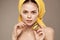 woman with a towel on her head naked shoulders kiwi vitamins freshness