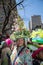 Woman with towering floral hat in Easter Bonnet Parade