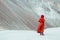 Woman in traditional Indian dress standing in desert in Ladakh, India