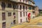 Woman in traditional nepalese dress drying rice in Kirtipur