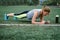 Woman training at the stadium. Physical activity and endurance.