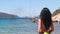 Woman travel blogger watch blue sea water yacht sail