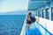 woman travel by sea and relax. Marine traveling and boat trip. Fashion and beauty look. Girl on ship deck in
