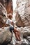 Woman traveler in amazing Avakas gorge, nature landscape, Cyprus. View of the popular canyon tourist