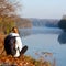 Woman traveler enjoy the recreation on the river-side