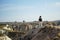 Woman traveler looking on amazing Cappadocia landscape