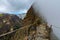 Woman traveler at Madeira mountain hiking path.