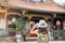 woman traveler visiting in Taiwan, Tourist with hat sightseeing in Longshan Temple, Chinese folk religious temple in Wanhua