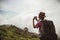 Woman traveling backpack her take a photo morning fog