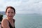 Woman traveling by boat among the islands.