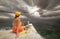 Woman traveling by boat among the islands before rain.