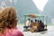 Woman traveling by boat on the river in China, Yangshuo