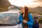 Woman traveling by car on the mountain road