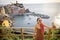 Woman traveling famous Cinque Terre towns in northwestern Italy