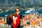 Woman traveling in old city Kotor, Montenegro