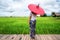 Woman traveller hiking Asian rice field landscape