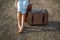 Woman traveller with vintage luggage