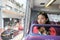 Woman travels with a double-decker bus