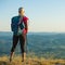 Woman on trekking - Beautiful blonde girl hiking on mountains