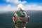 Woman is trekking in forest and highlands of mountains