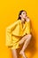 woman trendy beautiful lifestyle girl happy attractive yellow model young fashion