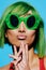 Woman trendy summer fashion sunglasses beauty swimsuit wig portrait brunette smile