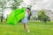 A woman tries to inflate an air sofa